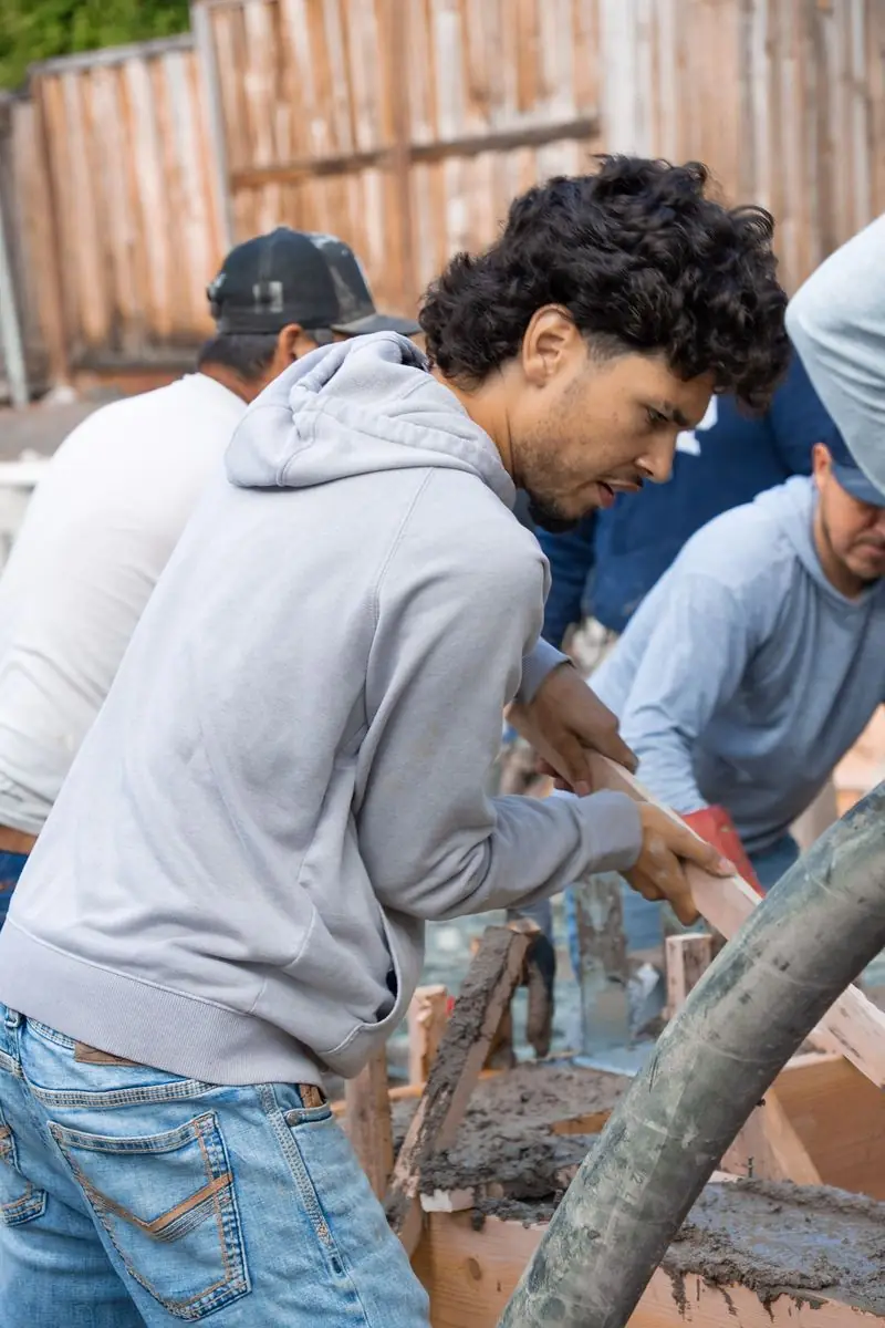 AZ Elevated Builders crew placing concrete on site